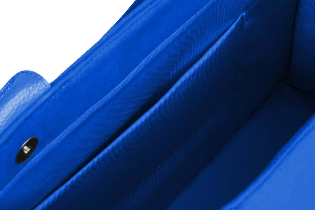 Intérieur du Grand cabas SLP en velours bleu, avec compartiments pratiques pour le rangement.
